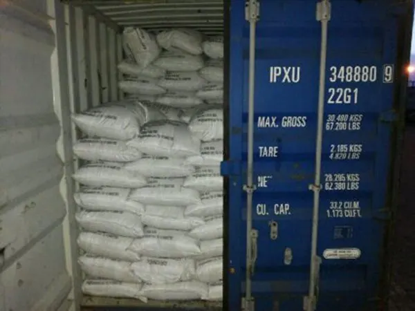 Loaded container ready for sealing